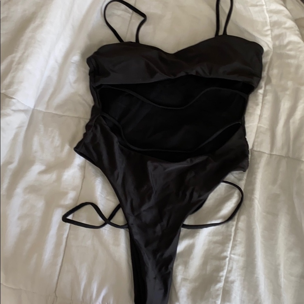 Worn once on spring break. One piece swimsuit